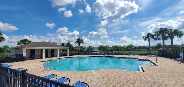 view of swimming pool featuring a patio