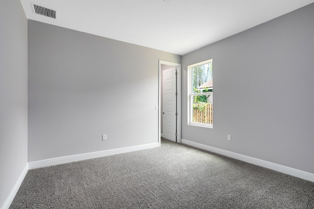 spare room with carpet floors