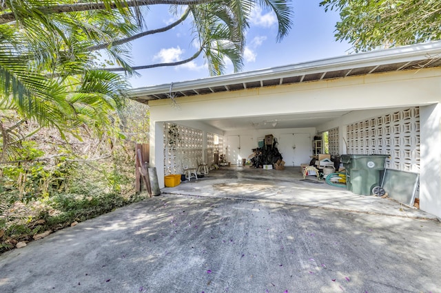 view of parking / parking lot with a carport