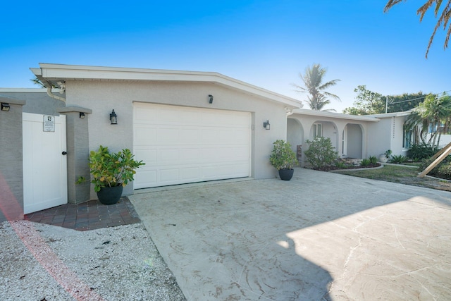 single story home with a garage