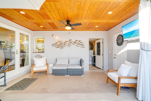 view of patio with french doors and ceiling fan