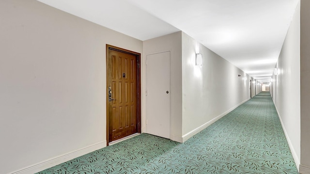 corridor featuring carpet floors