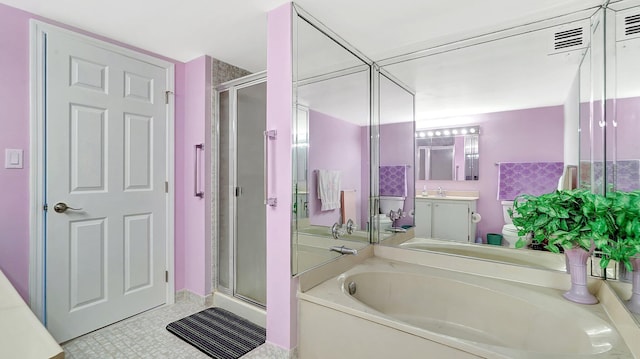 full bathroom featuring vanity, toilet, and shower with separate bathtub