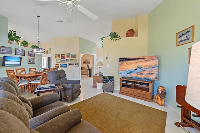 living room with light tile patterned flooring and ceiling fan