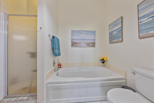 bathroom featuring shower with separate bathtub and toilet