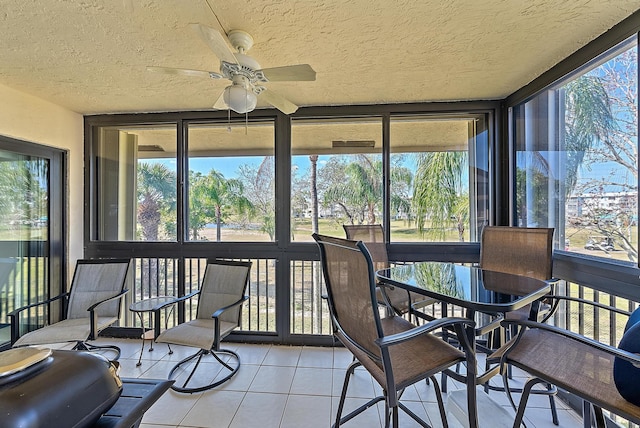 sunroom / solarium with ceiling fan