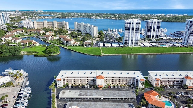 birds eye view of property featuring a water view