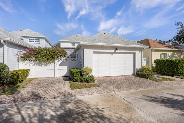 view of front of property featuring a garage