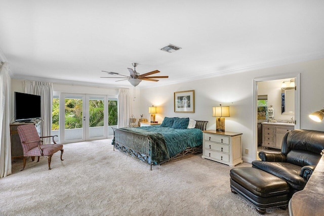 carpeted bedroom with ceiling fan, ensuite bathroom, ornamental molding, access to outside, and french doors