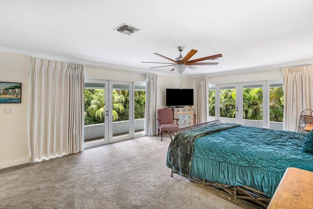 bedroom with carpet floors, access to outside, ceiling fan, crown molding, and french doors