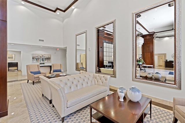 living room with a towering ceiling