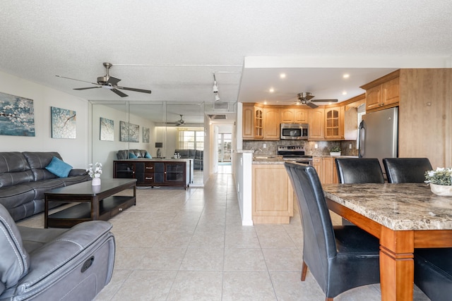 3021 Ventnor Cres, Deerfield Beach, FL 33442 - living room with ceiling fan, light tile patterned flooring, and a textured ceiling