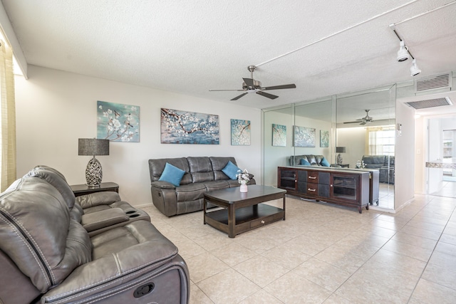 3021 Ventnor Cres, Deerfield Beach, FL 33442 - living room featuring ceiling fan, track lighting, a textured ceiling, and light tile patterned floors