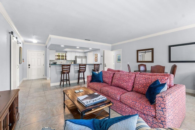 tiled living room featuring crown molding and a barn door