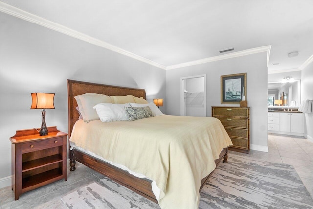 tiled bedroom featuring crown molding, a spacious closet, ensuite bath, and a closet