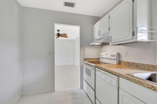 kitchen featuring ceiling fan, range with electric cooktop, white dishwasher, white cabinets, and light tile patterned flooring