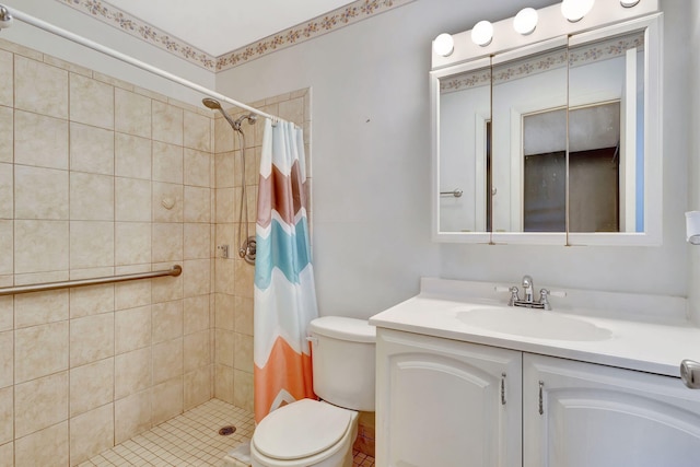 bathroom with vanity, toilet, and walk in shower