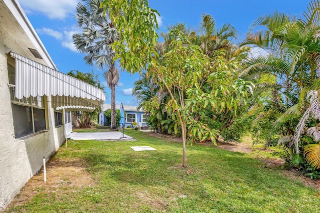 view of yard with a patio area