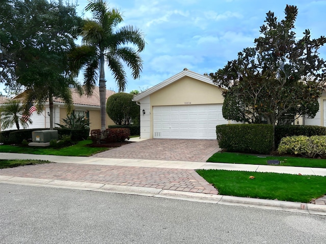 view of front of property featuring a garage