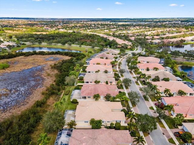 drone / aerial view featuring a water view