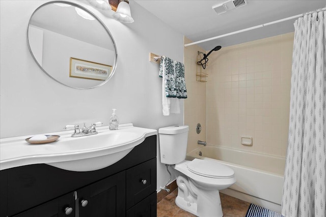 full bathroom featuring vanity, shower / tub combo, and toilet