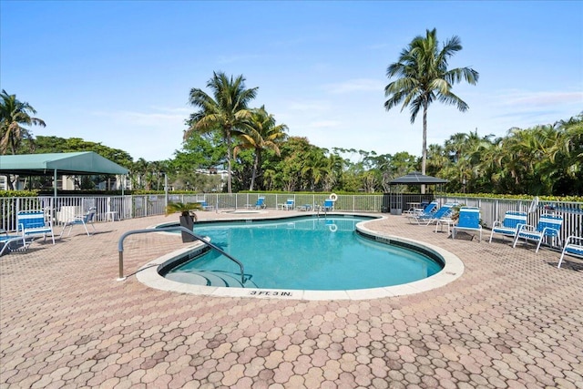 view of pool featuring a gazebo and a patio area