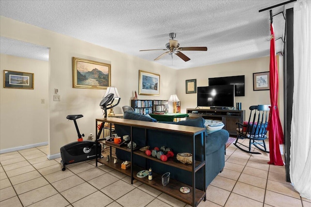 tiled living room with ceiling fan and a textured ceiling