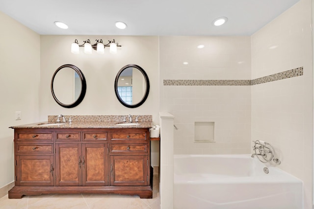 bathroom with tile patterned flooring and vanity