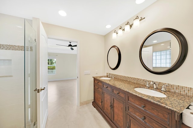 bathroom with decorative backsplash, tile patterned flooring, vanity, ceiling fan, and walk in shower