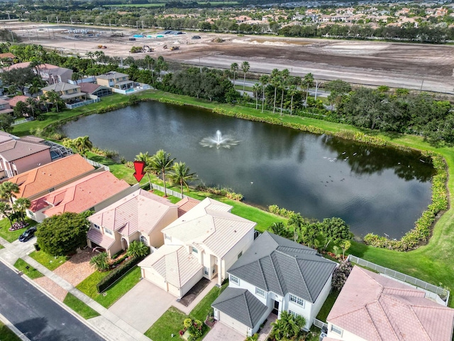 drone / aerial view featuring a water view