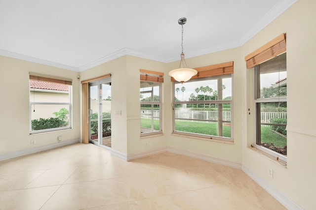 interior space with crown molding, a water view, and a wealth of natural light