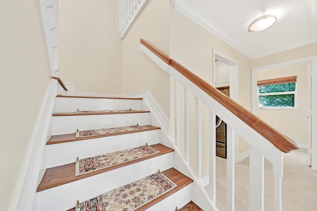 staircase with crown molding