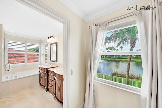 bathroom with tile patterned flooring, a water view, vanity, ornamental molding, and tiled bath