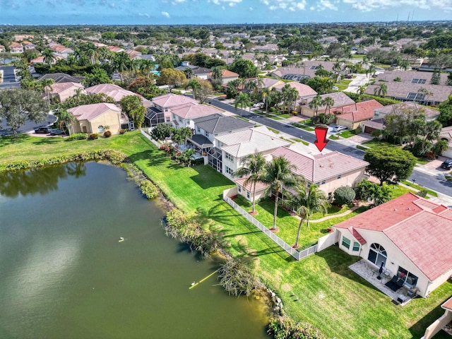 birds eye view of property featuring a water view