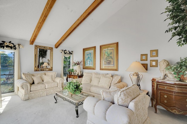 carpeted living room featuring vaulted ceiling with beams