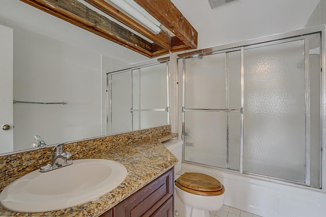 full bathroom with vanity, combined bath / shower with glass door, and toilet