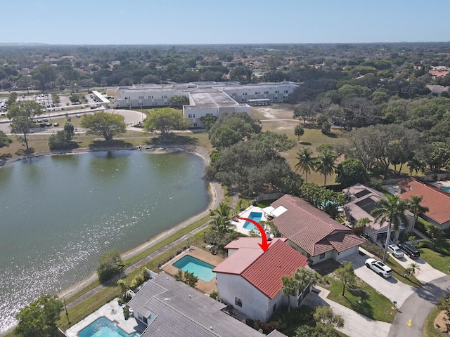 drone / aerial view with a water view