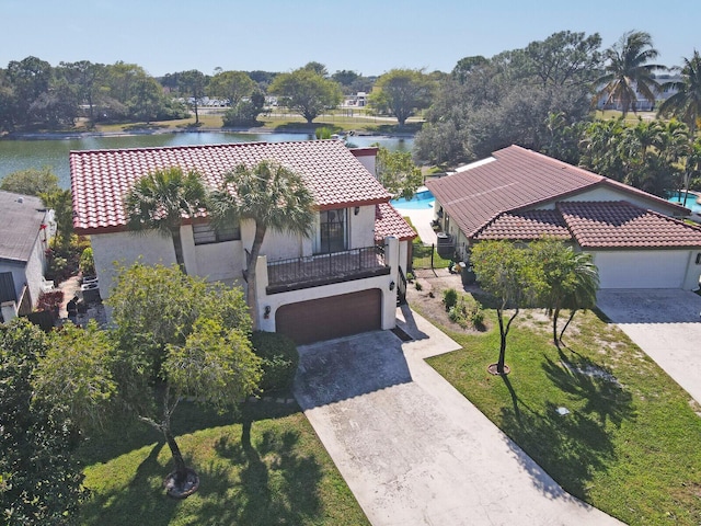 drone / aerial view featuring a water view