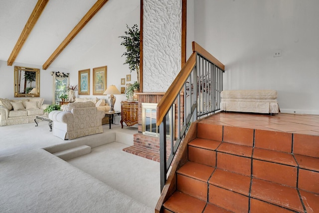 staircase with beam ceiling, carpet floors, high vaulted ceiling, and a wealth of natural light