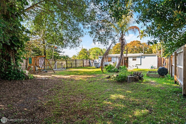 view of yard featuring a playground