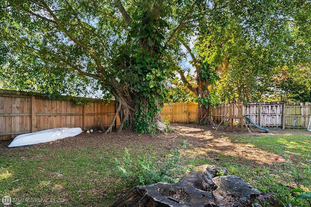 view of yard featuring a playground