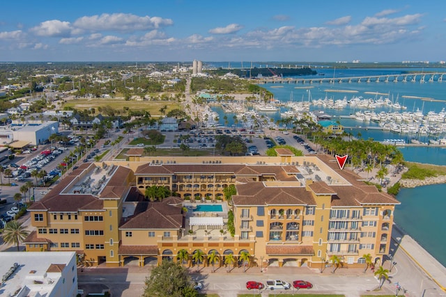 drone / aerial view with a water view