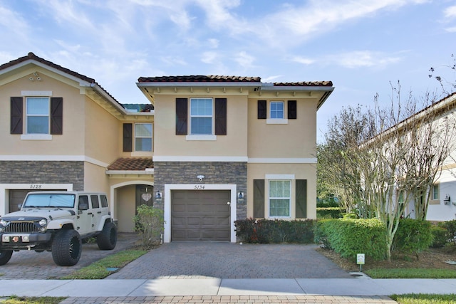 view of front of home with a garage