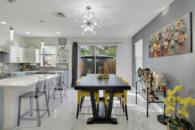 dining room with an inviting chandelier