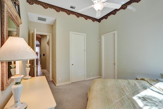 bedroom featuring light colored carpet