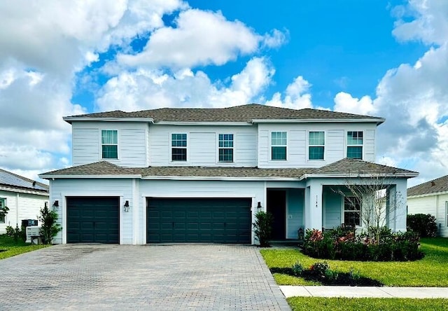 view of front of house with a garage