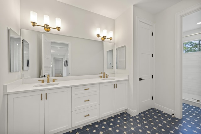 bathroom with walk in shower and vanity