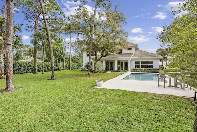 exterior space with a yard and a patio