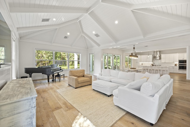 living room with beam ceiling, wooden ceiling, high vaulted ceiling, and light hardwood / wood-style flooring