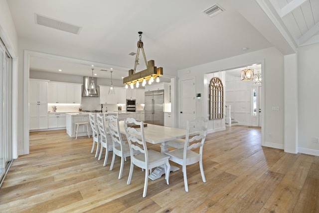 dining area featuring light hardwood / wood-style flooring